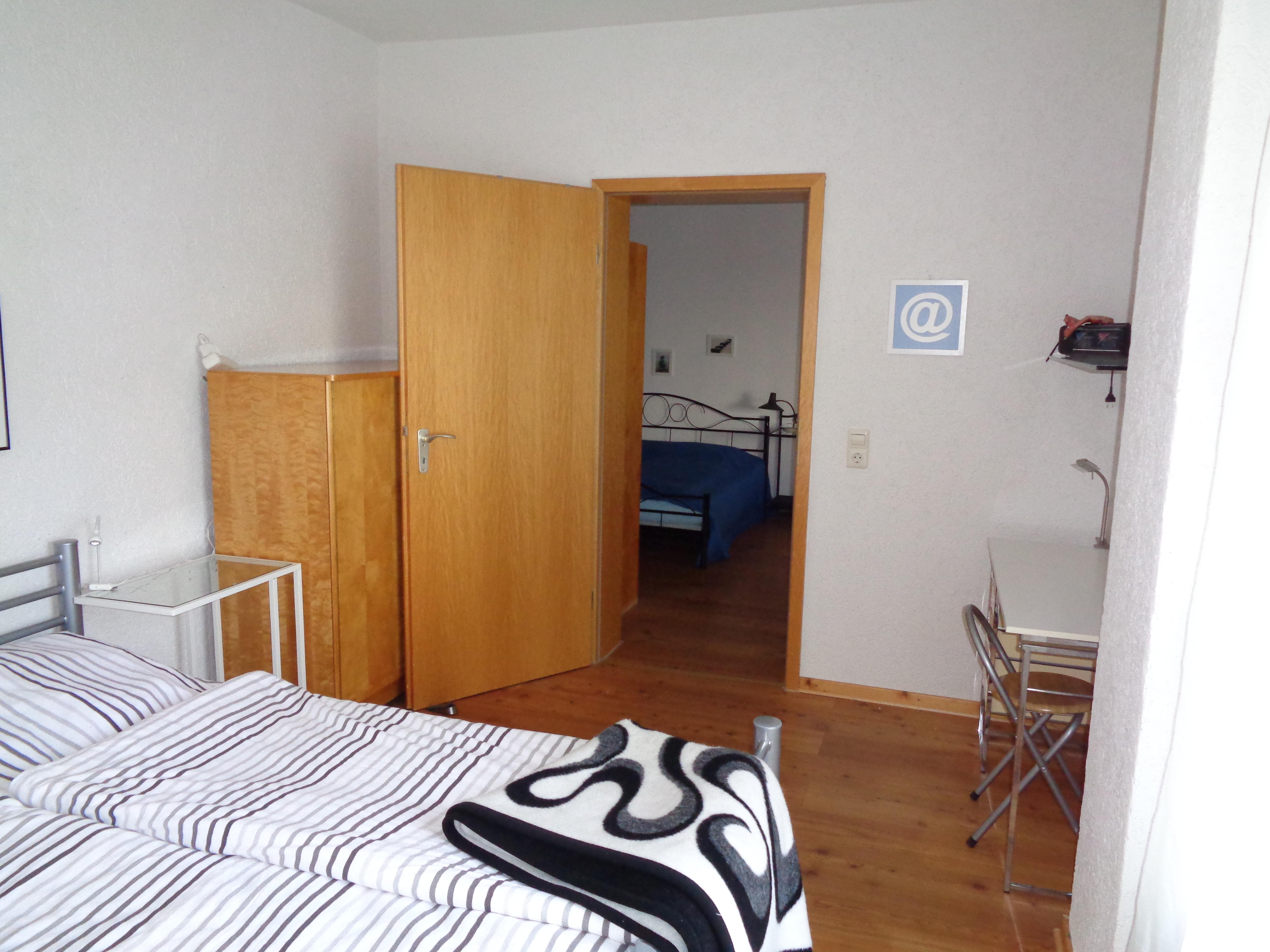 Foto: Schlafzimmer 2 - Verbindungstür zu Schlafzimmer 1